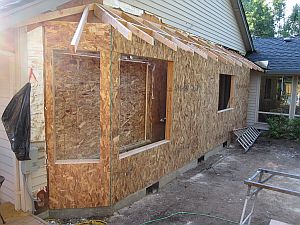 Full length exterior wall being extended during remodel